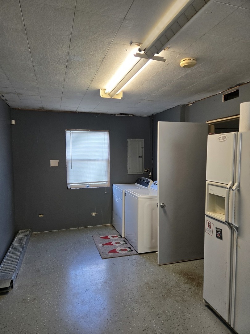 16517 Plainview Drive Markham, IL 60428 - Photo 22 of 30 a kitchen with refrigerator and white cabinets