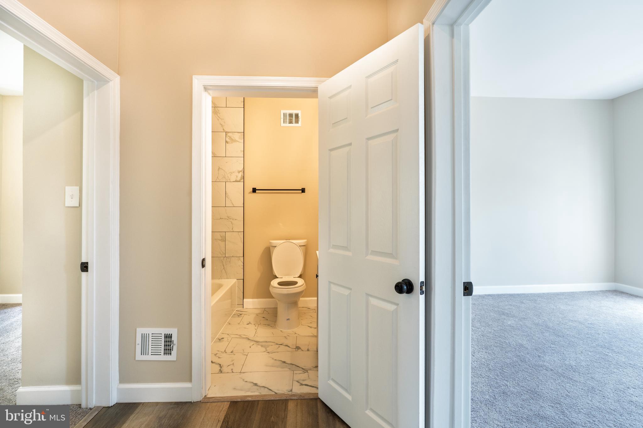 2808 Waldorf Avenue Baltimore, MD 21215 - Photo 16 of 26 a bathroom with a shower