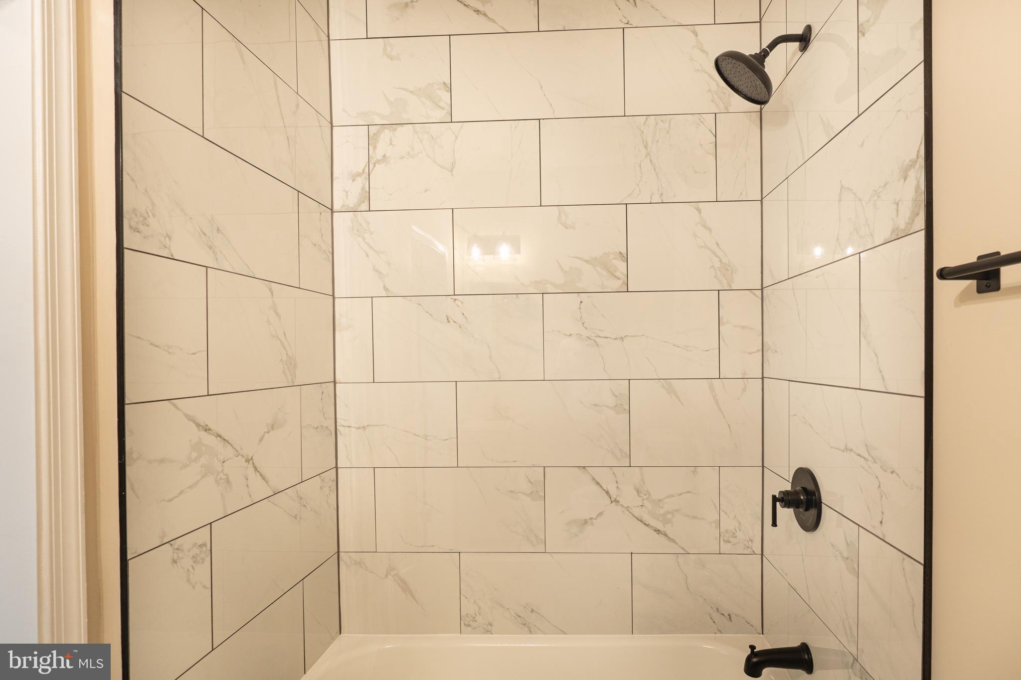 2808 Waldorf Avenue Baltimore, MD 21215 - Photo 17 of 26 a bathroom with a shower