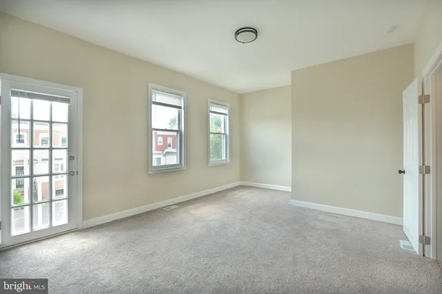 an empty room with windows