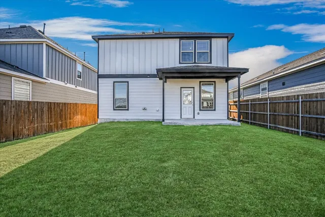 a house view with a garden space