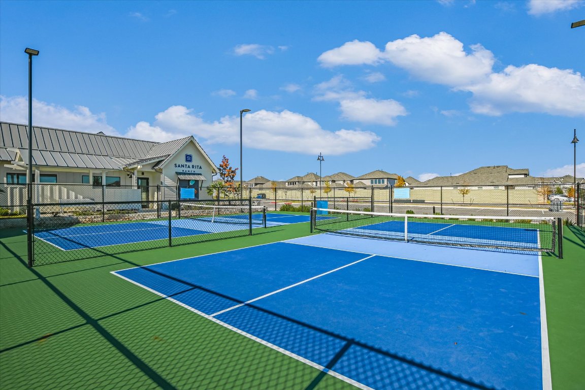 661 Pickrell Loop Georgetown, TX 78628 - Photo 27 of 27 a view of an outdoor space and tennis court