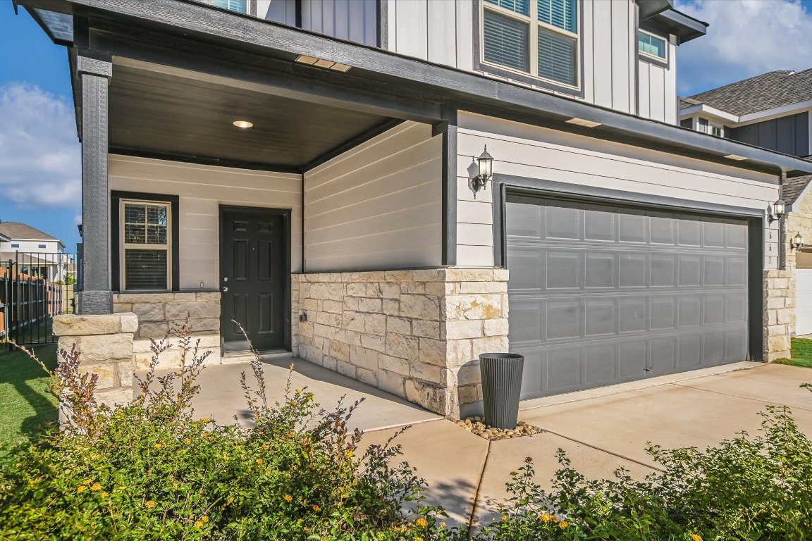 661 Pickrell Loop Georgetown, TX 78628 - Photo 3 of 27 front view of a house with a yard