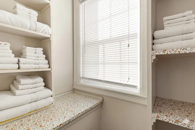 a view of a playground with basketball court