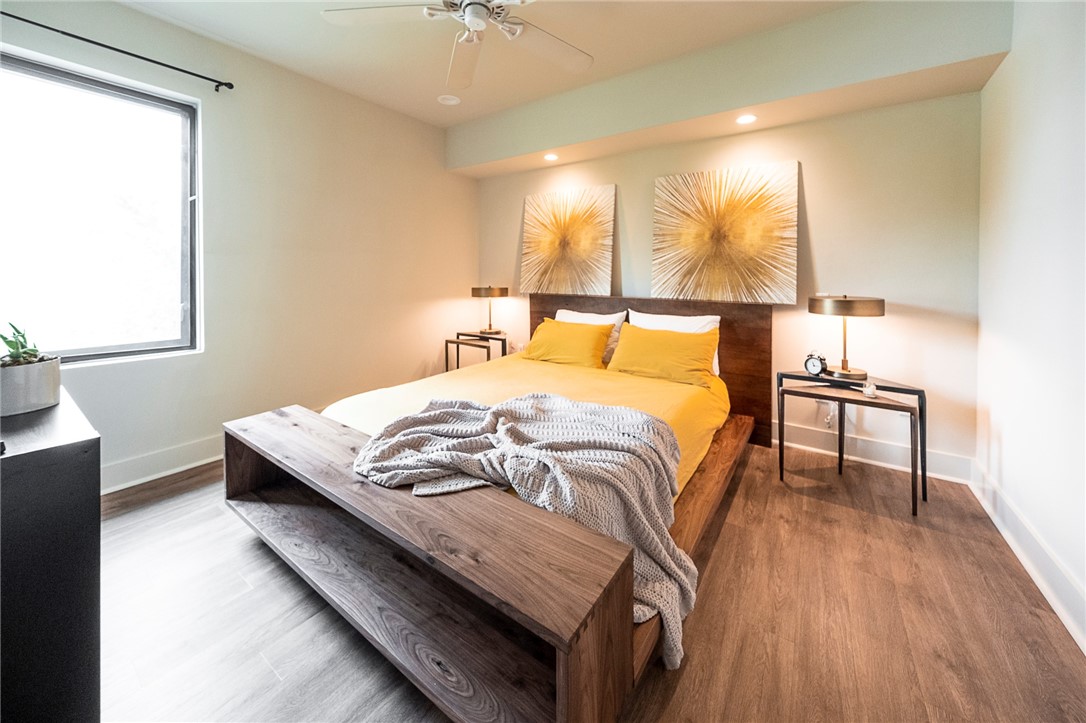 1603 Enfield Road, Unit 306 Austin, TX 78703 - Photo 6 of 16 Primary Bedroom Suite roomy enough for all Bed Sizes and Features an Enormous Walk In Closet, large enough to fit a Dresser!