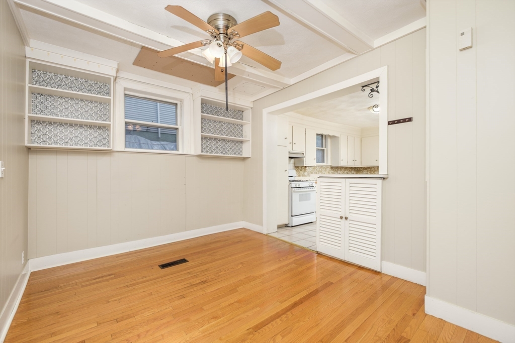 20 Hatch Street Everett, MA 02149 - Photo 9 of 16 wooden floor in an empty room with a window