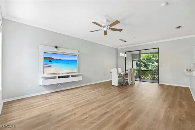a view of livingroom with hardwood floor and window