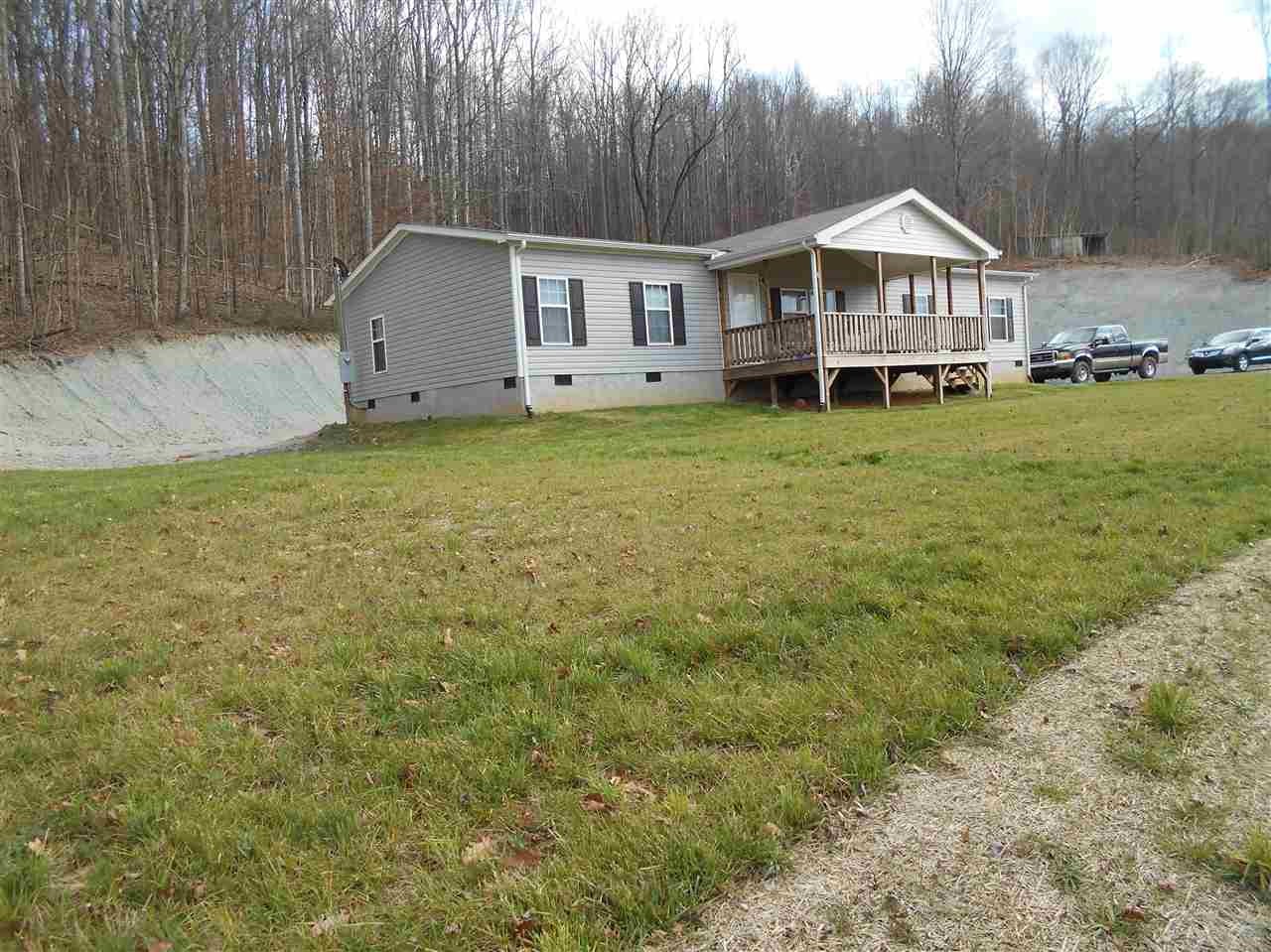 1300 Moss Road Philadelphia, TN 37846 - Photo 1 of 1 a front view of a house with garden