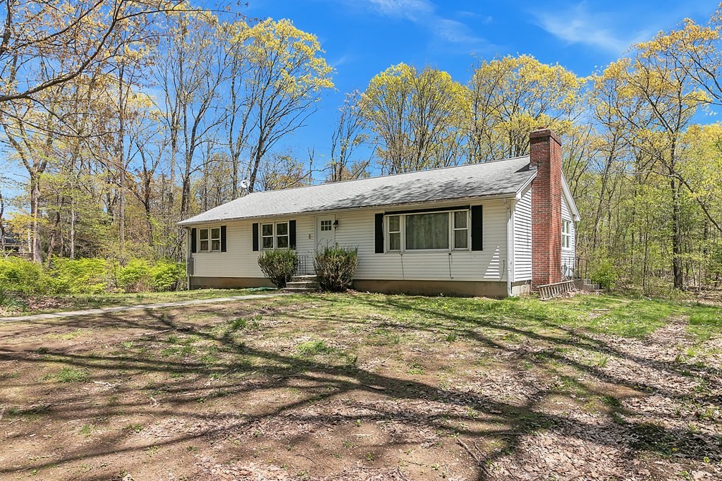 34 1/2 Paradise Lake Road Monson, MA 01057 - Photo 2 of 30 a view of a house with backyard and trees