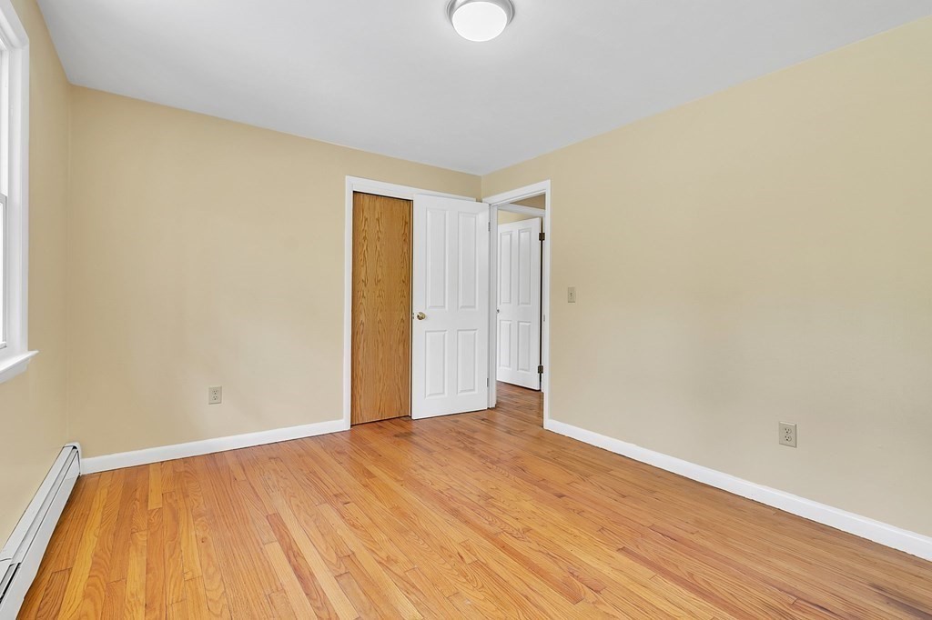 34 1/2 Paradise Lake Road Monson, MA 01057 - Photo 23 of 30 a view of empty room with wooden floor