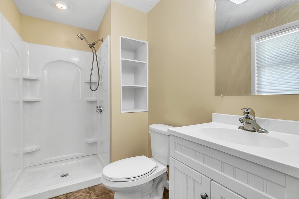 34 1/2 Paradise Lake Road Monson, MA 01057 - Photo 27 of 30 a bathroom with a sink toilet and shower