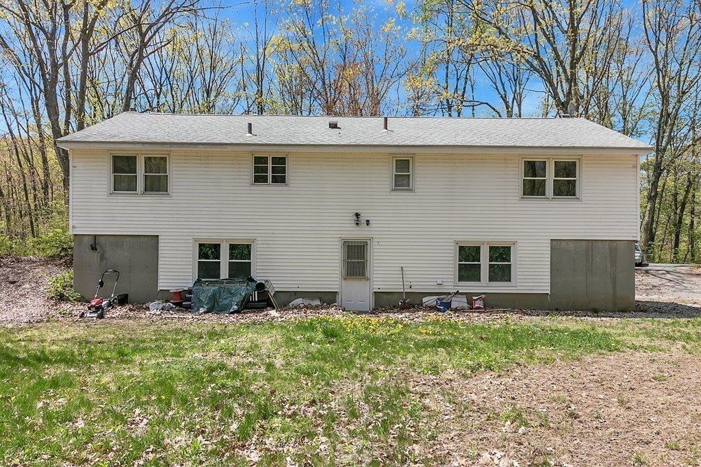 34 1/2 Paradise Lake Road Monson, MA 01057 - Photo 8 of 30 a front view of a house with garden