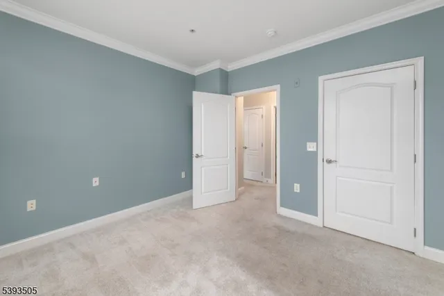 an empty room with closet area