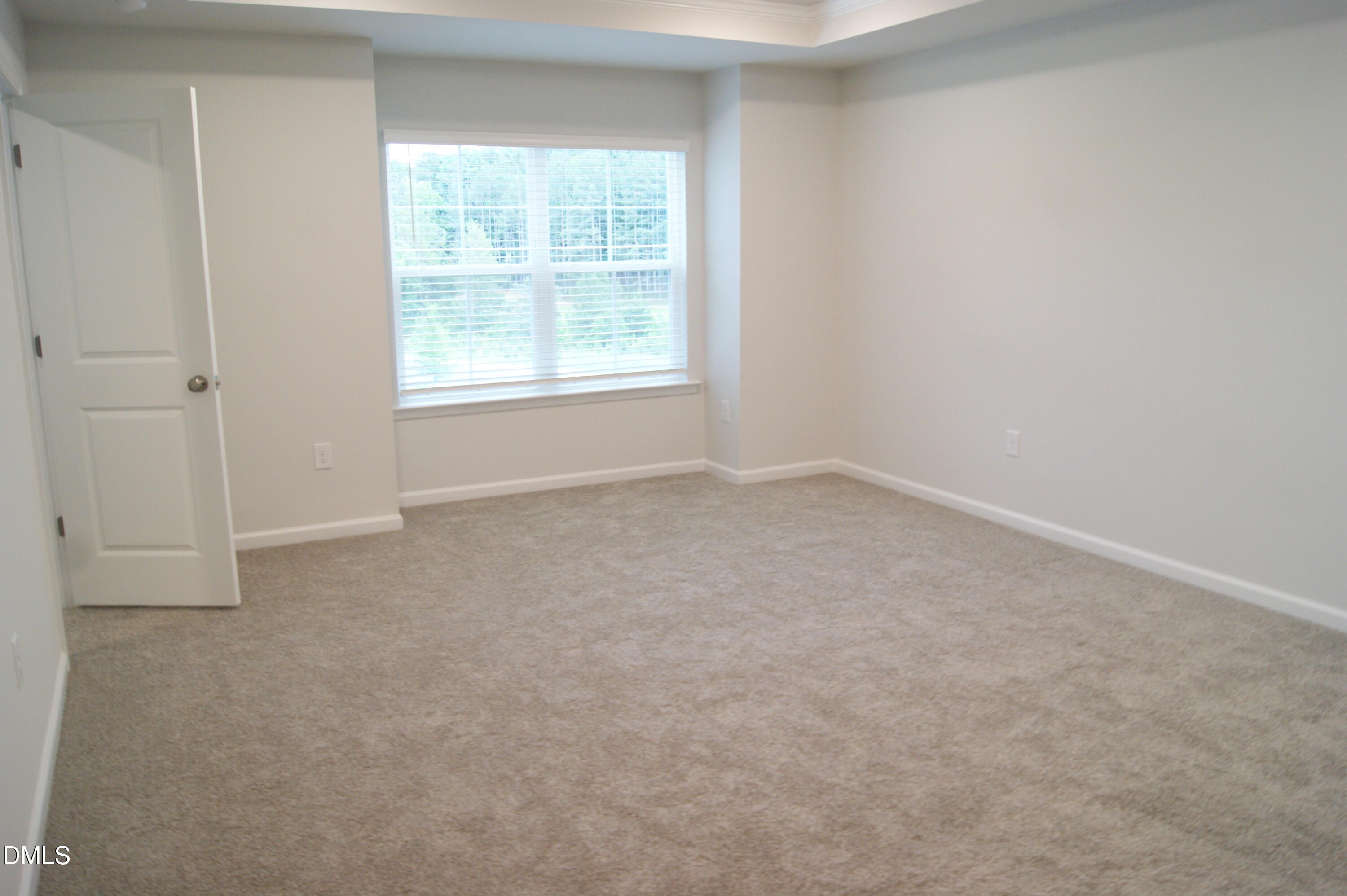 295 Glenmore Gardens Road Raleigh, NC 27603 - Photo 11 of 30 an empty room with windows