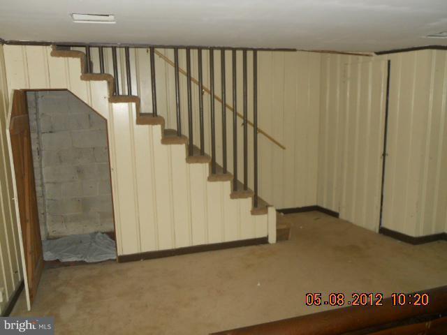 3922 Clarinth Road Baltimore, MD 21215 - Photo 7 of 10 a view of a hallway with staircase