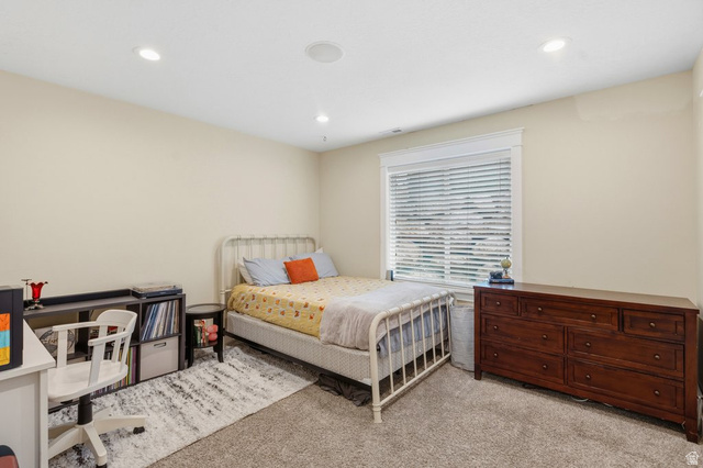 672 Perry Hollow Drive Mapleton, UT 84664 - Photo 59 of 106 Carpeted room featuring recessed lighting and a window with white blinds and trim