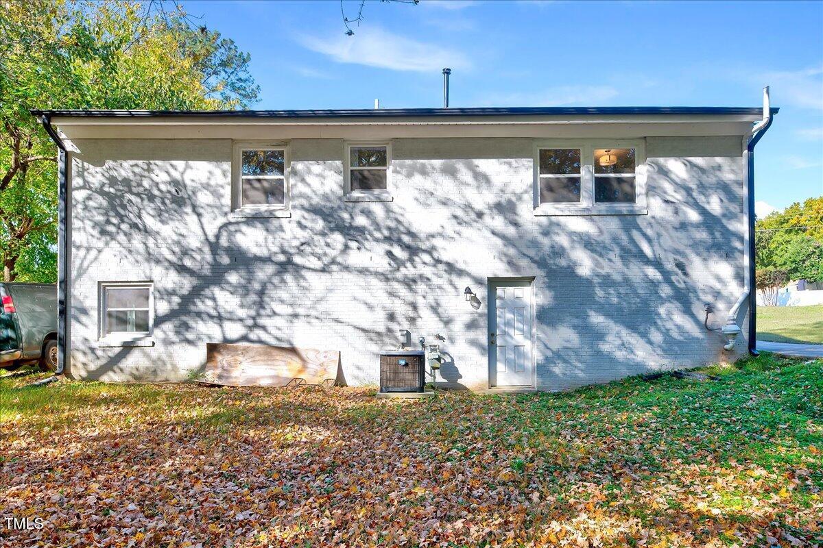 2809 Newark Drive Raleigh, NC 27610 - Photo 32 of 36 a front view of a house with garden