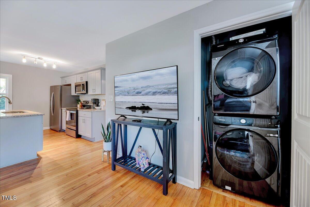 2809 Newark Drive Raleigh, NC 27610 - Photo 8 of 36 a view of a kitchen with washer and dryer