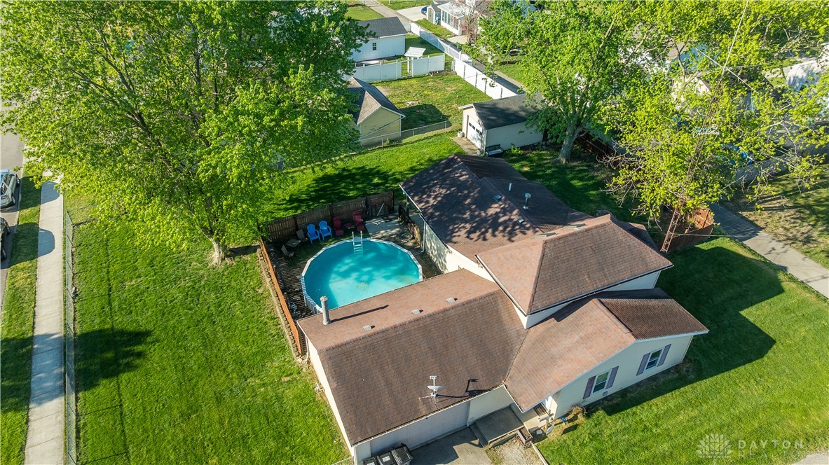 220 Racer Street Troy, OH 45373 - Photo 32 of 33 An aerial view showcases a large double lot property featuring a fenced yard and inviting above-ground pool.