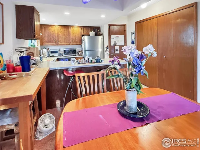 a view of a dining room with furniture