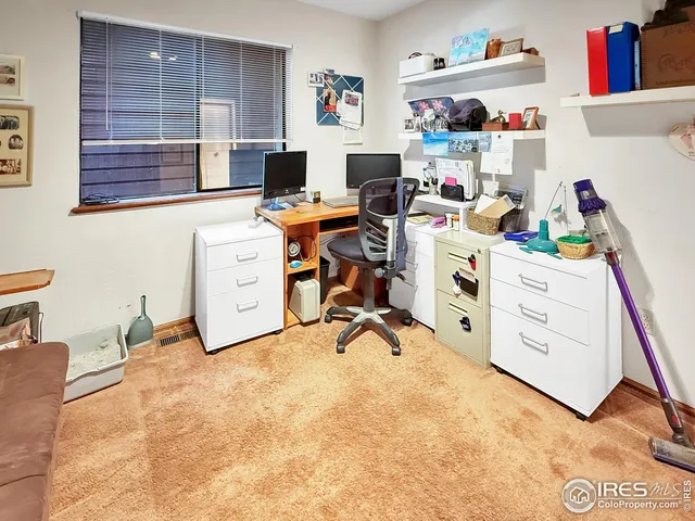 a view of workspace with cabinets