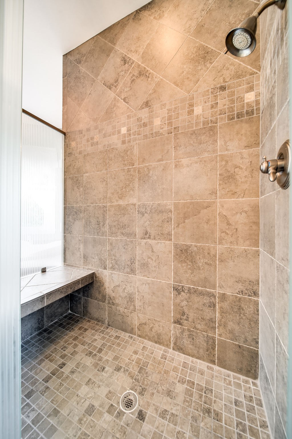 909 Williamson County Line Road Fairview, TN 37062 - Photo 28 of 66 a bathroom with a bathtub and shower