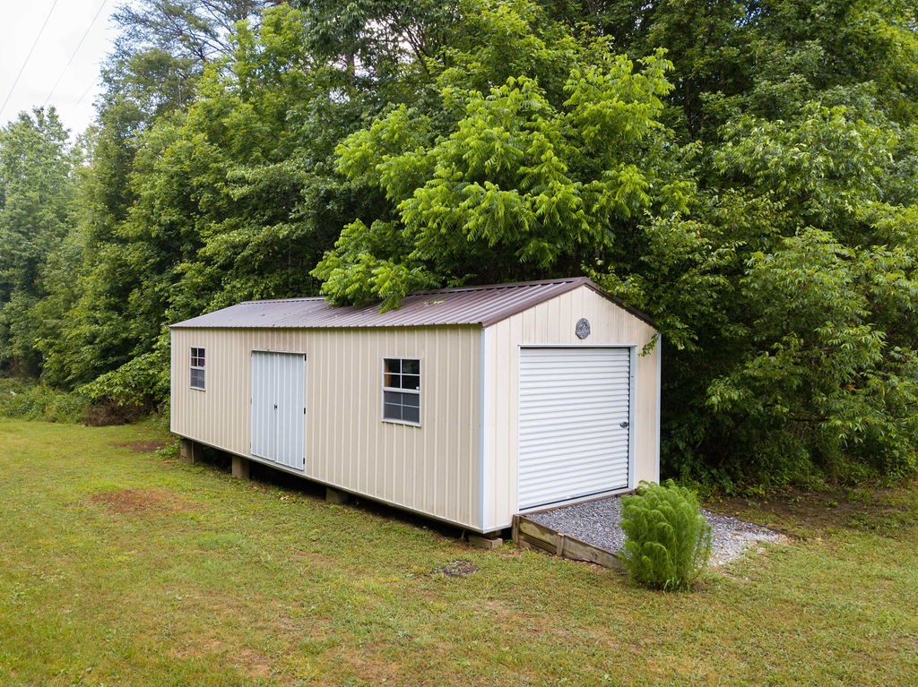 909 Williamson County Line Road Fairview, TN 37062 - Photo 56 of 66 a house view with a backyard space