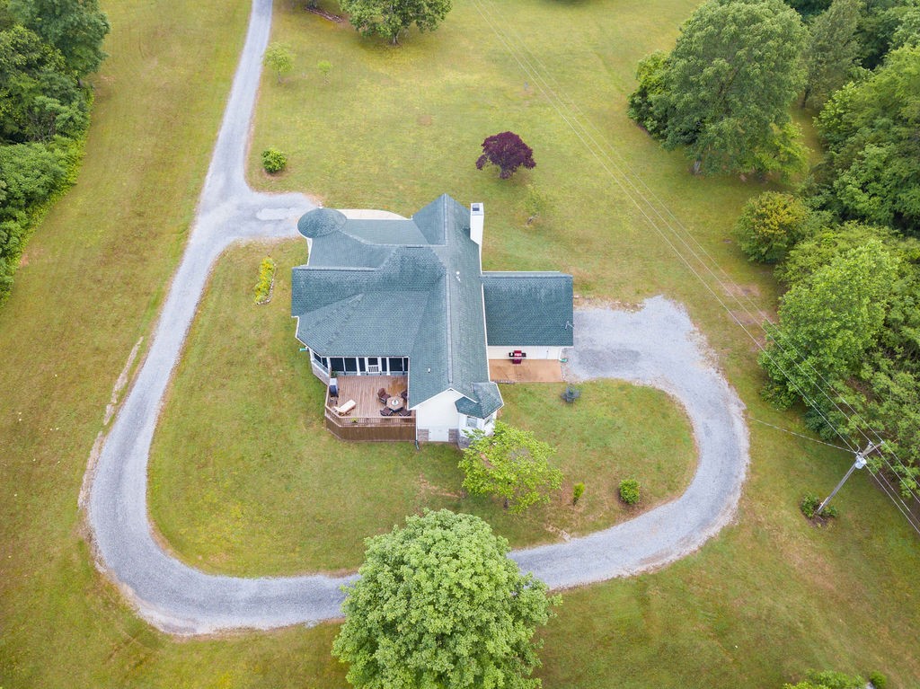 909 Williamson County Line Road Fairview, TN 37062 - Photo 64 of 66 a view of a swimming pool with a yard