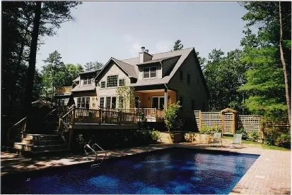 a front view of a house with swimming pool