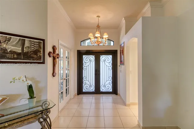a living room with furniture and window