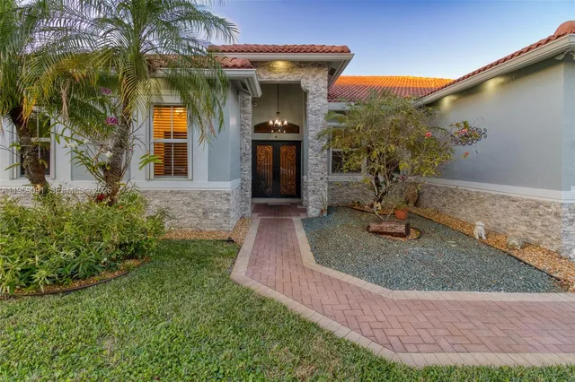 a vase of flowers sitting on a table