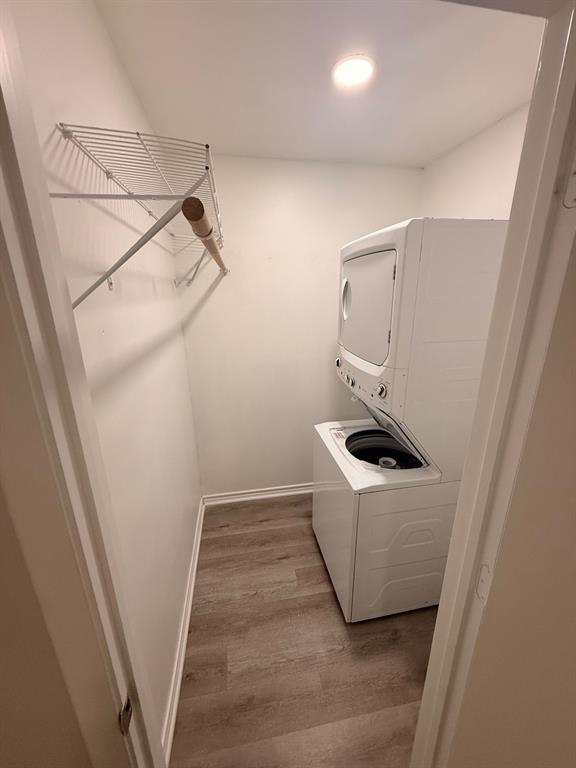 3933 Inwood Road, Unit 2025 Dallas, TX 75209 - Photo 12 of 26 a utility room with dryer and washer