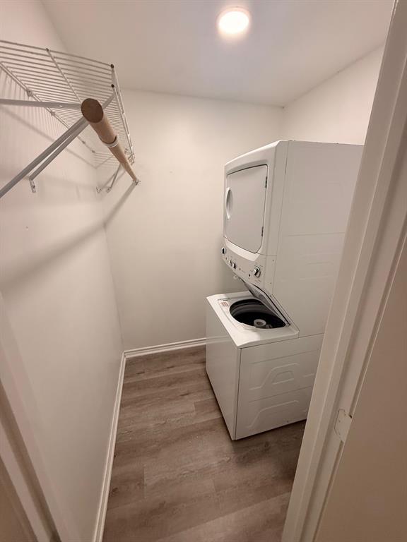 3933 Inwood Road, Unit 2025 Dallas, TX 75209 - Photo 13 of 26 a utility room with dryer and washer