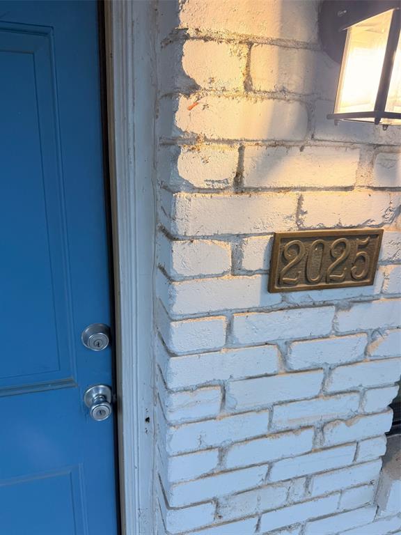 3933 Inwood Road, Unit 2025 Dallas, TX 75209 - Photo 21 of 26 a view of wooden door
