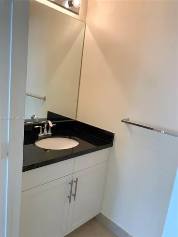 a close view of sink and mirror