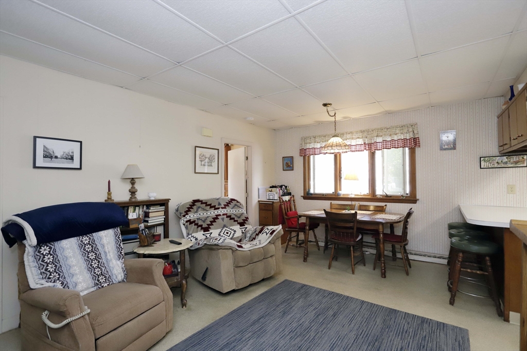 5 Anthony Street Acushnet, MA 02743 - Photo 18 of 37 a living room with furniture and a wooden floor
