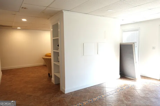 a view of a room with a hallway