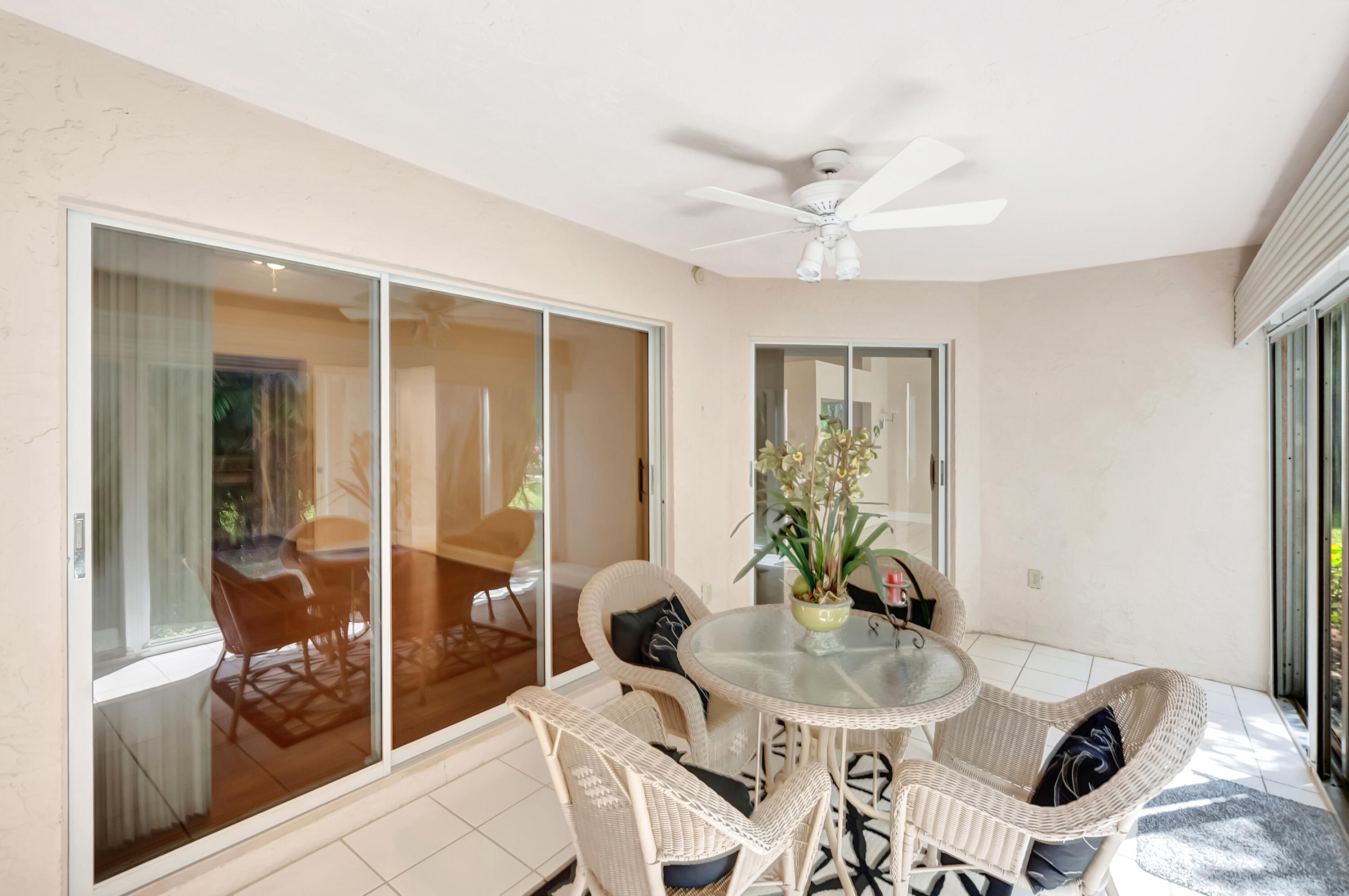 11128 Rios Road Boca Raton, FL 33498 - Photo 34 of 45 a living room with furniture and a large window