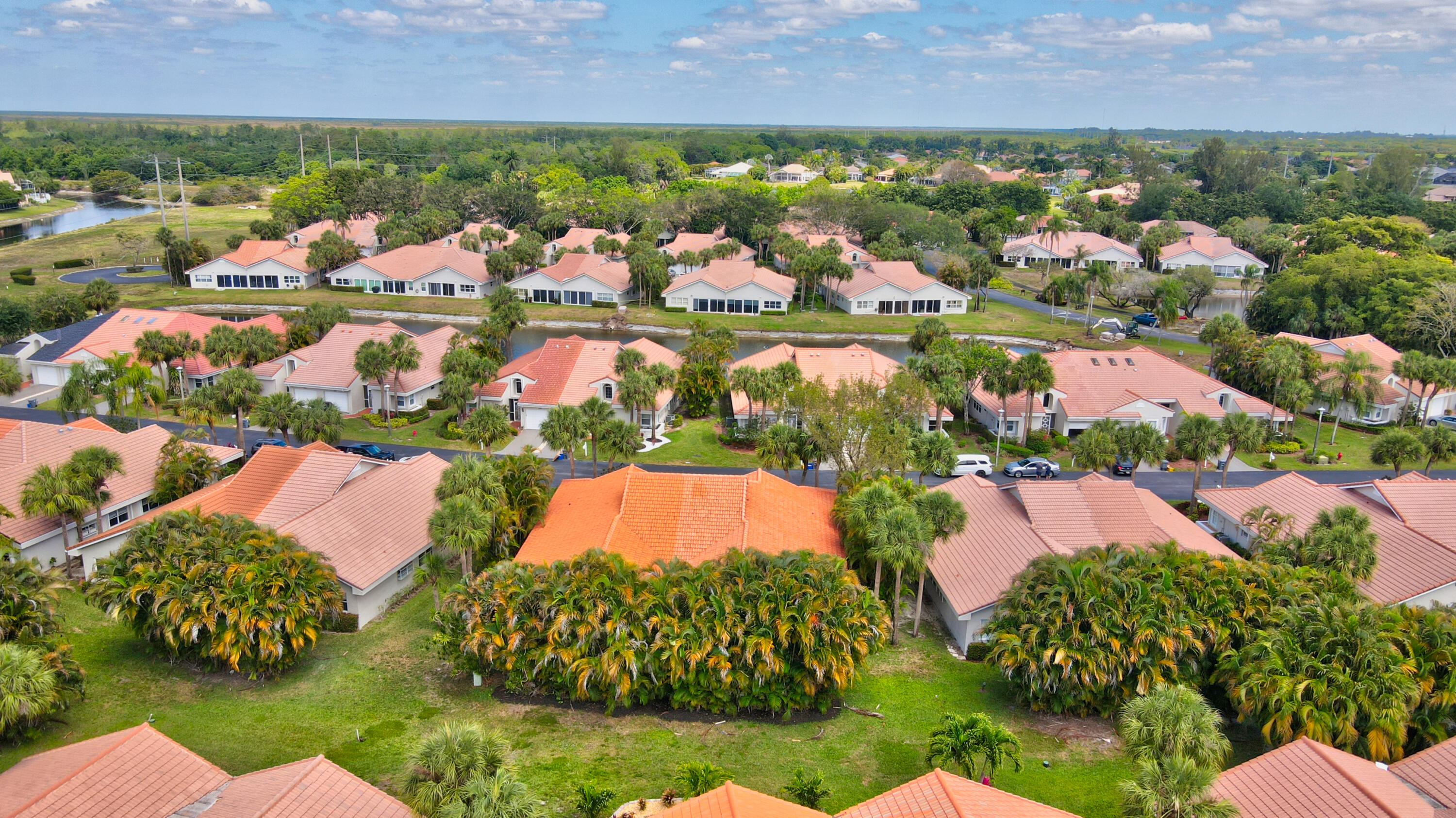 11128 Rios Road Boca Raton, FL 33498 - Photo 41 of 45 an aerial view of residential houses with outdoor space