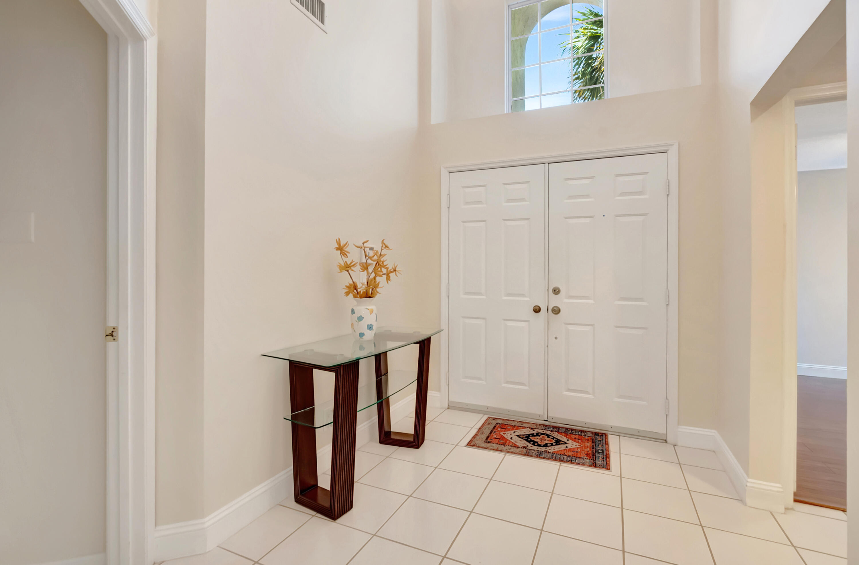 11128 Rios Road Boca Raton, FL 33498 - Photo 7 of 45 a view of an entryway with seating