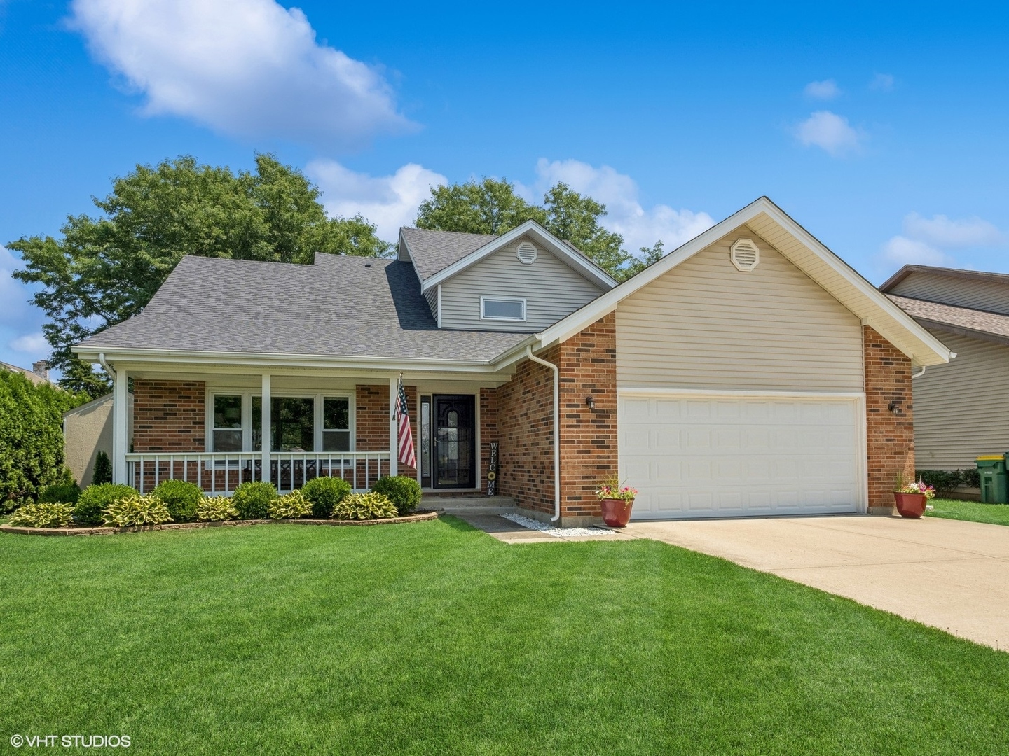 651 Garth Road Wheeling, IL 60090 - Photo 1 of 24 a front view of a house with garden