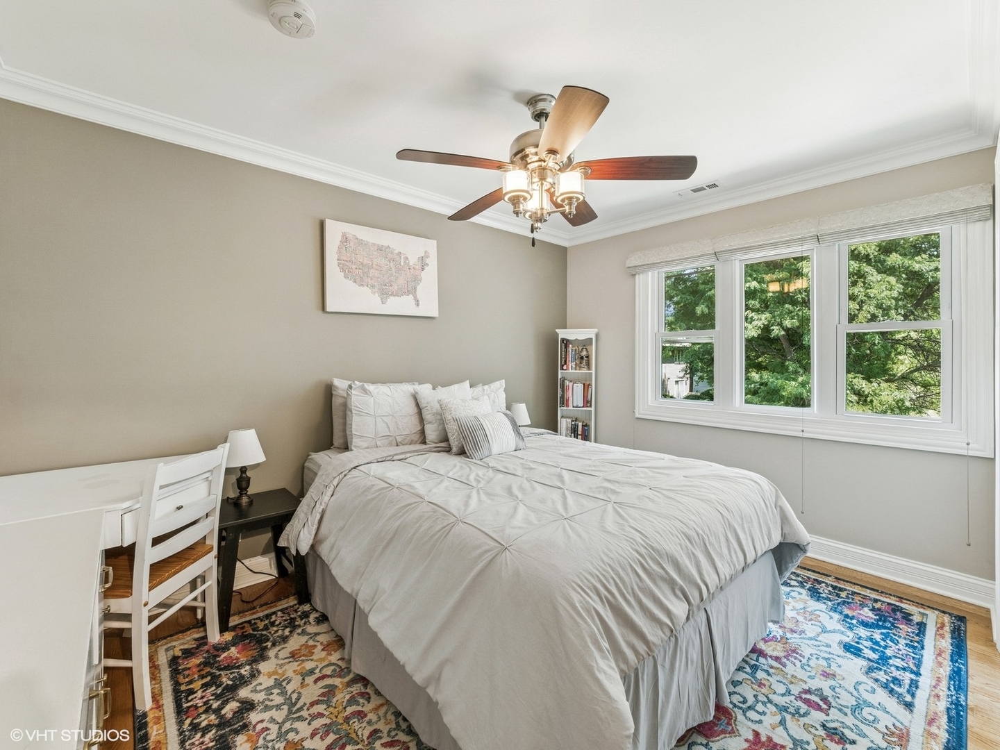 651 Garth Road Wheeling, IL 60090 - Photo 13 of 24 a bedroom with a bed and a chandelier