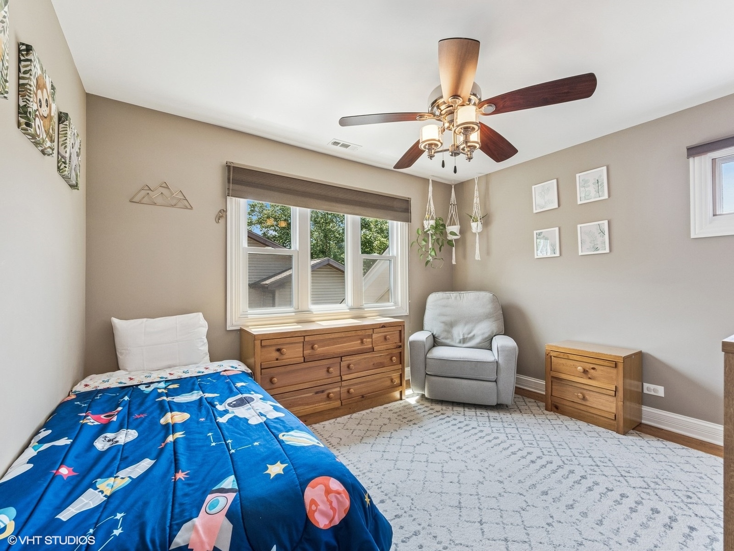 651 Garth Road Wheeling, IL 60090 - Photo 14 of 24 a bedroom with furniture and a window