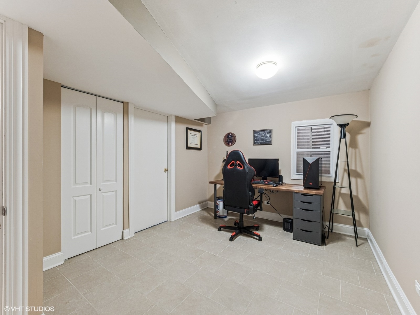651 Garth Road Wheeling, IL 60090 - Photo 18 of 24 a view of a workspace with furniture and a window