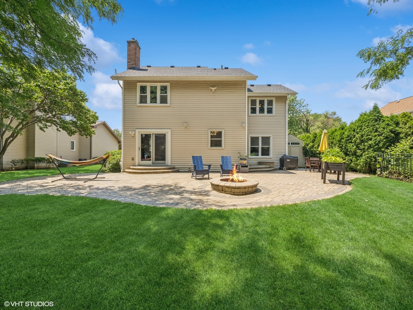 651 Garth Road Wheeling, IL 60090 - Photo 20 of 24 a swimming pool with outdoor seating and yard