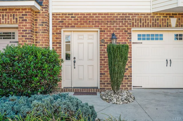 a view of a backyard with sitting area
