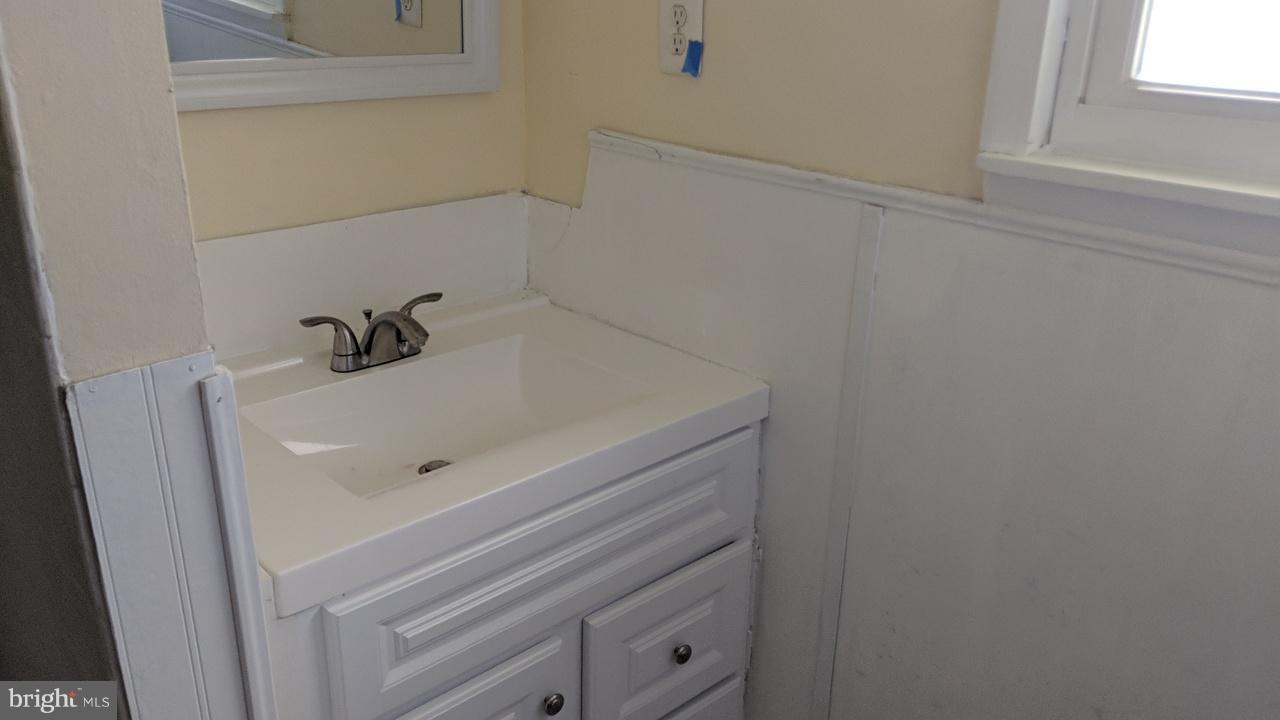 1 Wengate Road Owings Mills, MD 21117 - Photo 13 of 24 a bathroom with a sink