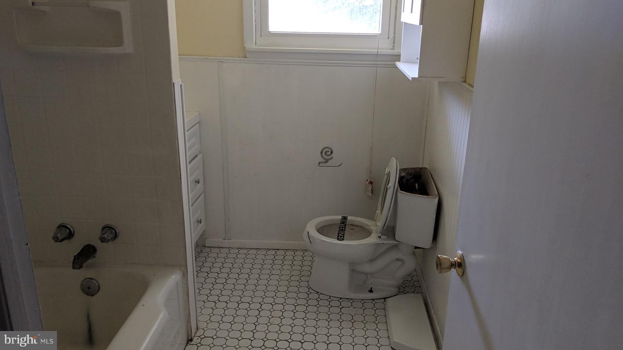 1 Wengate Road Owings Mills, MD 21117 - Photo 21 of 24 a bathroom with a sink and a toilet