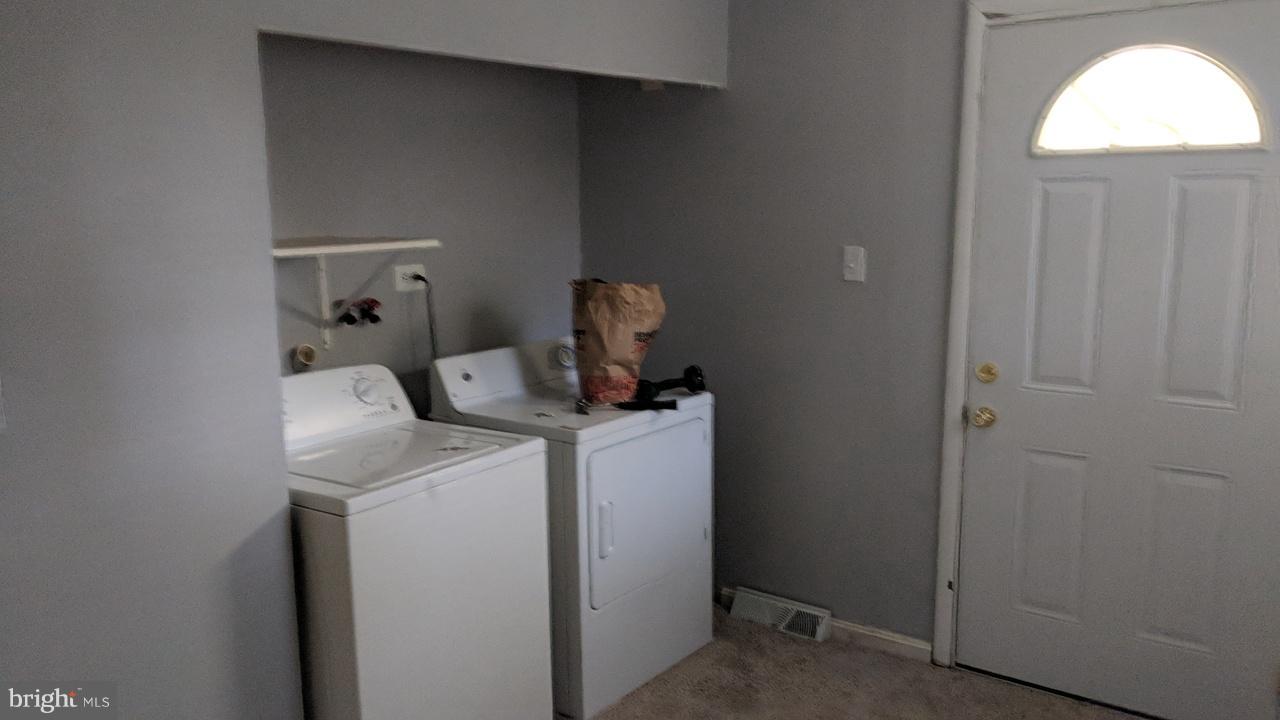 1 Wengate Road Owings Mills, MD 21117 - Photo 23 of 24 a room that has a mirror and a table in it