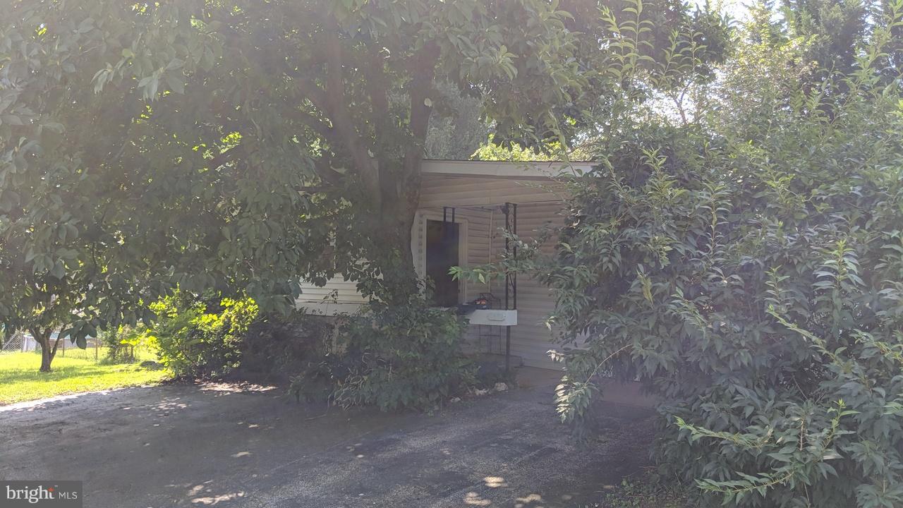 1 Wengate Road Owings Mills, MD 21117 - Photo 10 of 24 a view of a house with a yard